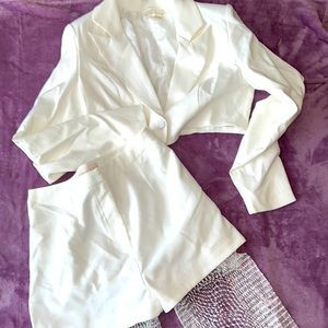 Two piece set. All white. Cropped jacket w/ matching high waisted studded pants.